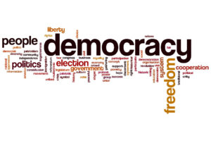 Democracy concept word cloud background